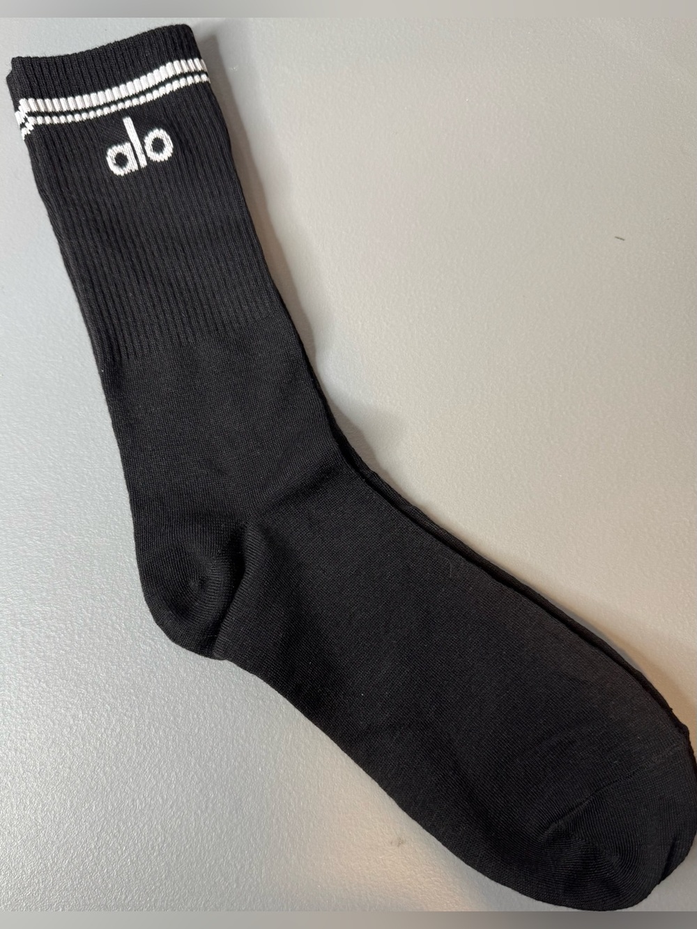 ALO Yoga Black unisex throwback ribbed cuff Socks w/ White Stripes contrast logo
